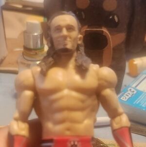Action Figure with Red and Black Shorts Adrian Neville